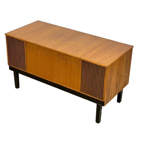 899 - A Mid Century teak radiogram. WYE Electronics LTD. 100x44.5c55cm