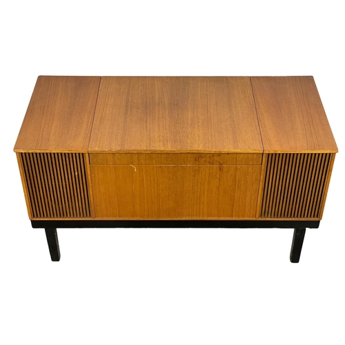 899 - A Mid Century teak radiogram. WYE Electronics LTD. 100x44.5c55cm