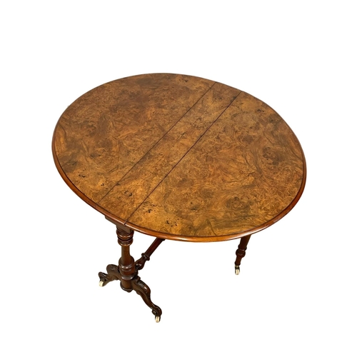 901 - A large Victorian Burr Walnut Sutherland table. Circa 1860. Open 108x91x72cm