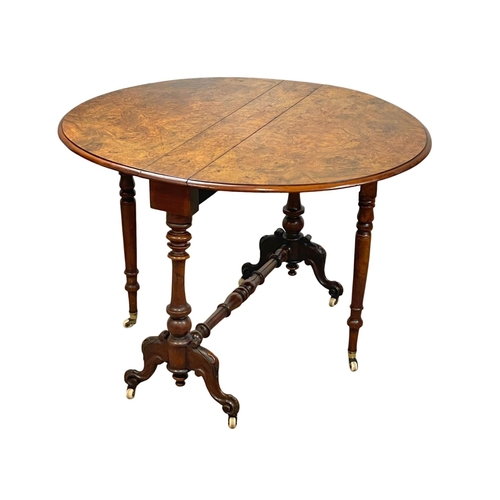 901 - A large Victorian Burr Walnut Sutherland table. Circa 1860. Open 108x91x72cm