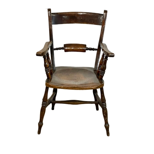 903 - A Victorian Elm and Beech kitchen chair.