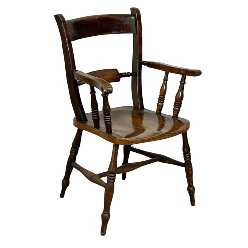 903 - A Victorian Elm and Beech kitchen chair.