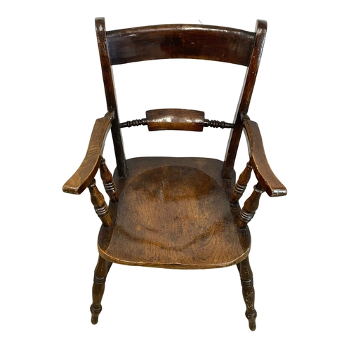 903 - A Victorian Elm and Beech kitchen chair.