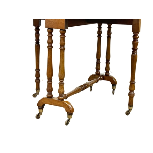 905 - A large Victorian oak Sutherland table on brass cup casters. Circa 1880. 102x90x73cm