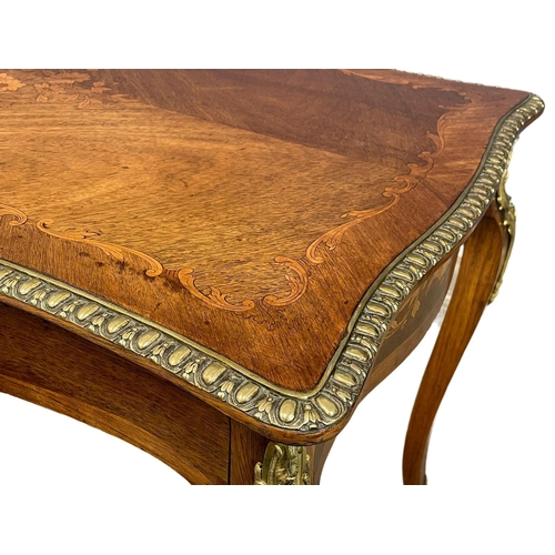 906 - A good quality vintage 18th century style French inlaid rosewood writing desk, with brass ormolu mou... 