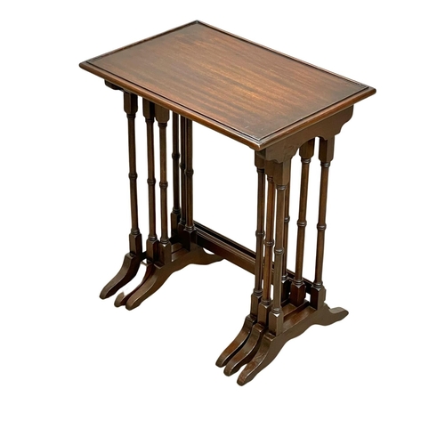 908 - A vintage mahogany Georgian style nest of tables.