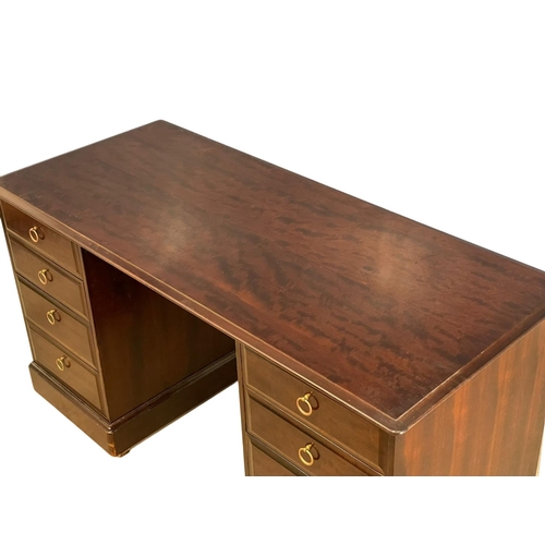 94 - A Stag mahogany desk. 148x64.5x78