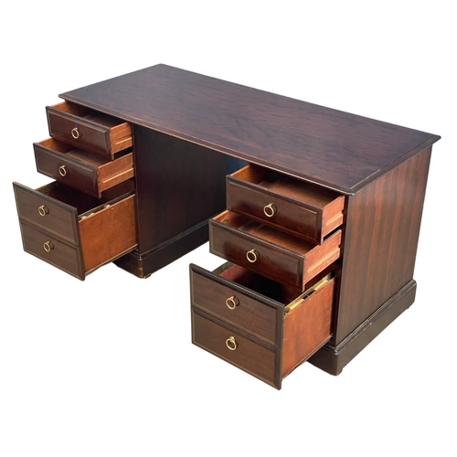 94 - A Stag mahogany desk. 148x64.5x78