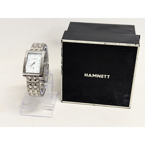 606 - A gents Hamnett watch in original box.