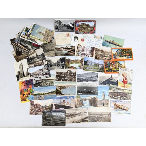 610 - A collection of vintage postcards