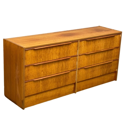 886 - A large Danish Mid Century chest of drawers by Steens. 146x40x67cm