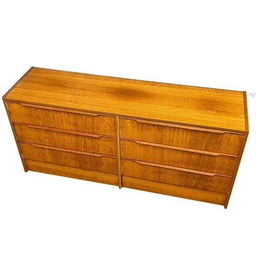 886 - A large Danish Mid Century chest of drawers by Steens. 146x40x67cm