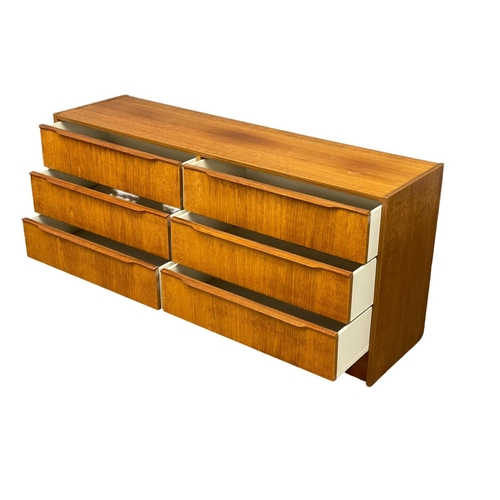 886 - A large Danish Mid Century chest of drawers by Steens. 146x40x67cm