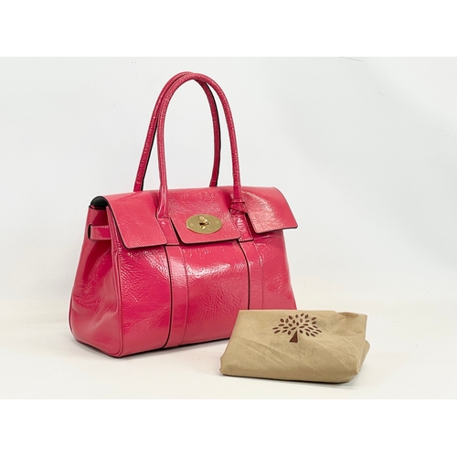 611 - A Mulberry Bayswater leather handbag with cover. 36 x 18 x 45cm