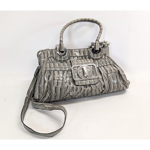 612 - 2 ladies bags by GUESS and DKNY