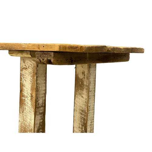 907 - A large early 20th century pine industrial console table. 240x51x83cm