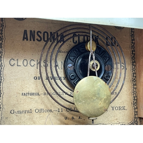 389Q - A late 19th century American walnut mantle clock by Ansonia Clock Company, with key, pendulum. 24x10... 