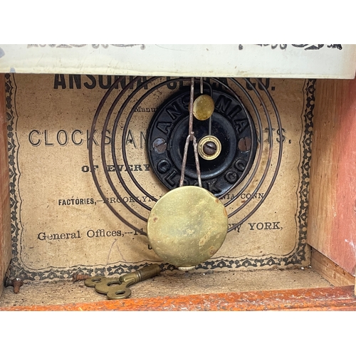 389Q - A late 19th century American walnut mantle clock by Ansonia Clock Company, with key, pendulum. 24x10... 