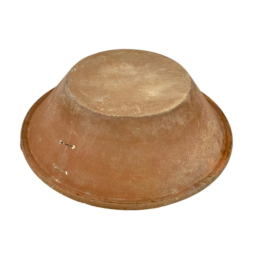 389T - A very large late 19th century French terracotta dough bowl. 71x22cm