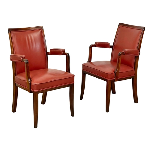 1087 - A pair of good quality mahogany and leather armchairs.