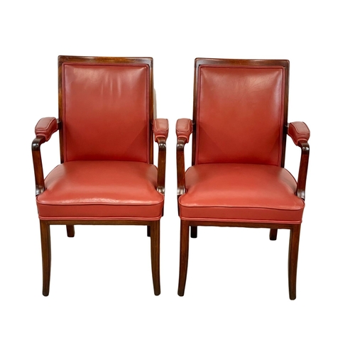 1087 - A pair of good quality mahogany and leather armchairs.