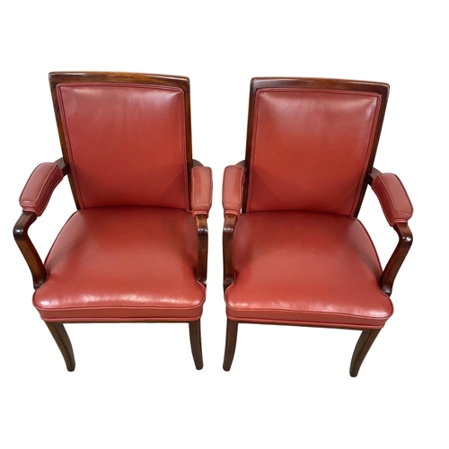 1087 - A pair of good quality mahogany and leather armchairs.