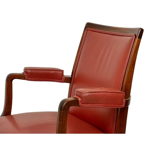 1087 - A pair of good quality mahogany and leather armchairs.