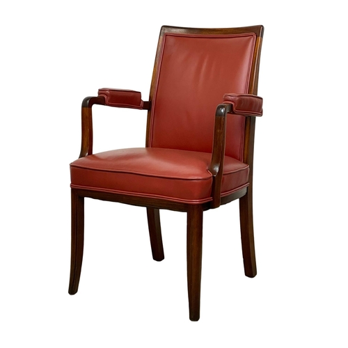 1087 - A pair of good quality mahogany and leather armchairs.