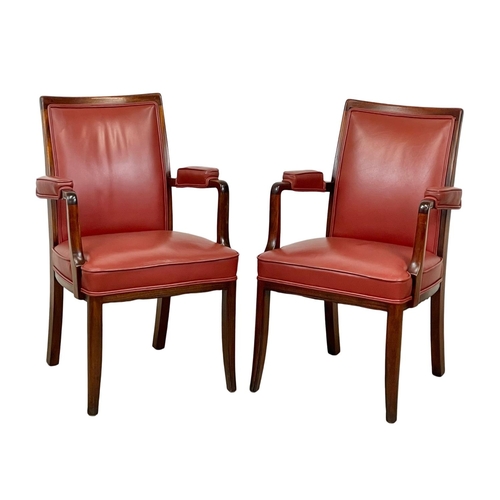 1087 - A pair of good quality mahogany and leather armchairs.