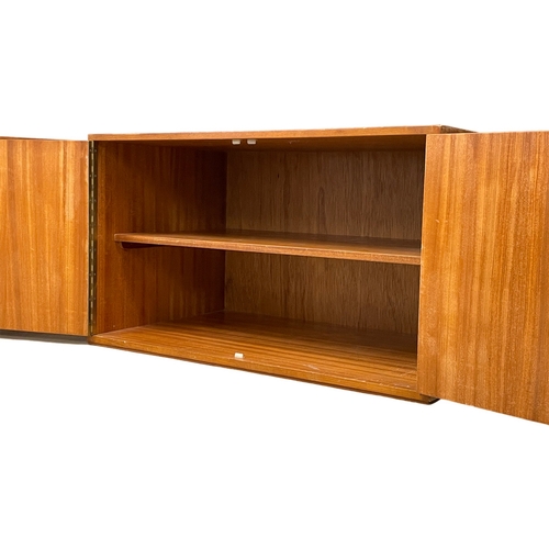 1090 - A pair of large Mid Century teak cabinet. 90x54x52cm