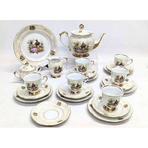 705 - 23 piece Chodziez tea set, including tea pot.