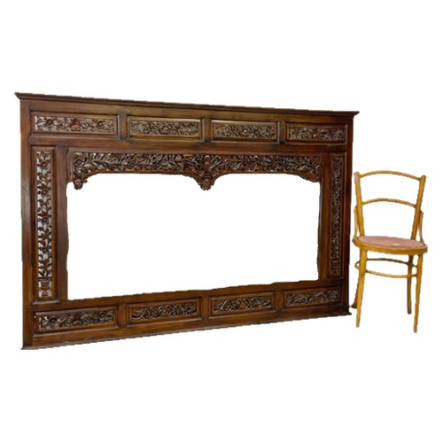 80 - A very large carved mahogany framed over-mantle mirror. 185x115cm