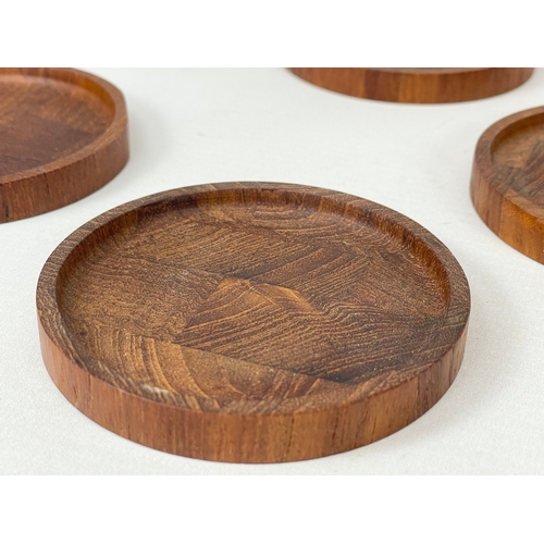 9 - A set of 6 Danish Mid Century teak drinks coasters. 8cm