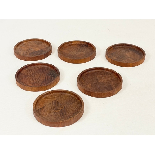 9 - A set of 6 Danish Mid Century teak drinks coasters. 8cm