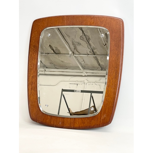 10 - A Mid Century teak framed mirror. 51x59cm