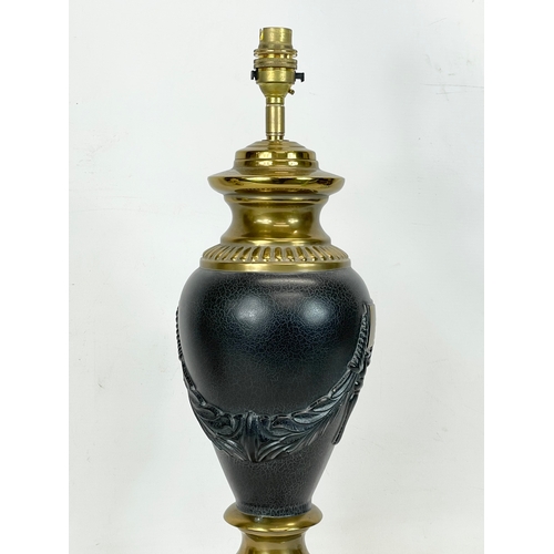 267 - 2 large ornate brass table lamps. 52cm