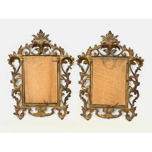 14 - A pair of late Victorian ornate brass mirrors in the Rococo style. 22x30cm