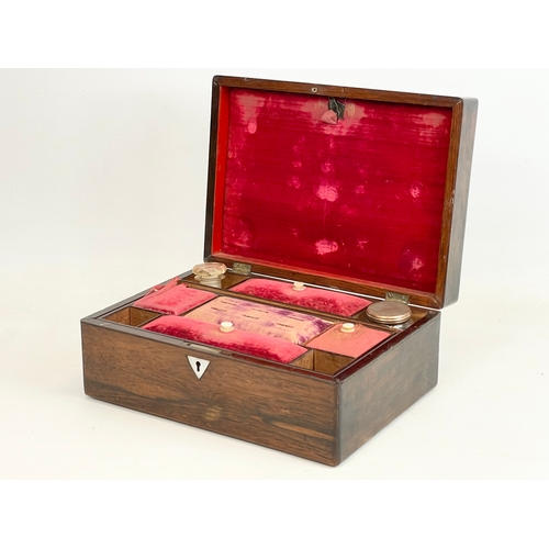 16 - A Victorian rosewood vanity box with inlaid Mother of Pearl. 28x20x12cm