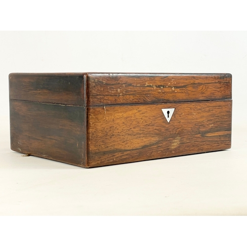 16 - A Victorian rosewood vanity box with inlaid Mother of Pearl. 28x20x12cm