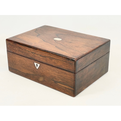 16 - A Victorian rosewood vanity box with inlaid Mother of Pearl. 28x20x12cm