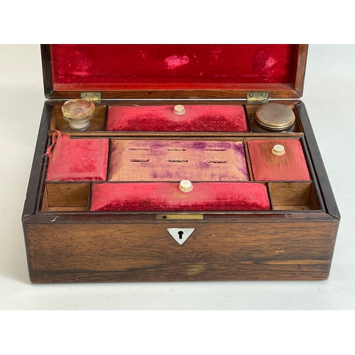 16 - A Victorian rosewood vanity box with inlaid Mother of Pearl. 28x20x12cm