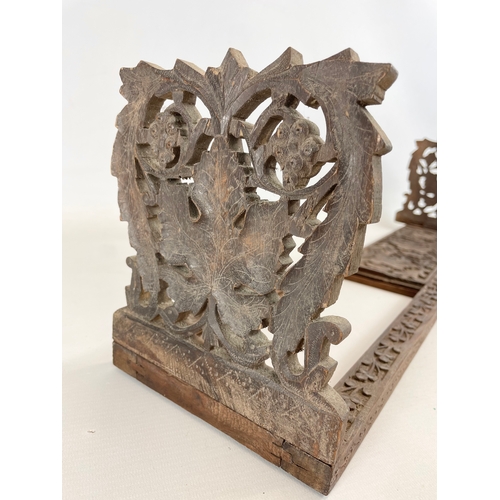 268 - An early 20th century Indian carved teak extending bookstand. Closed 40cm. Open 76cm