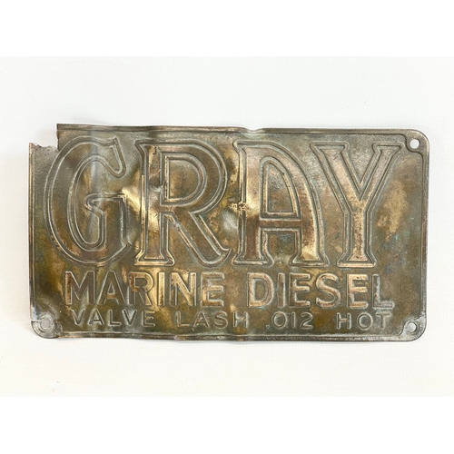 66 - An early to mid 20th century Gray Marine Diesel Company sign. 18x9.5cm