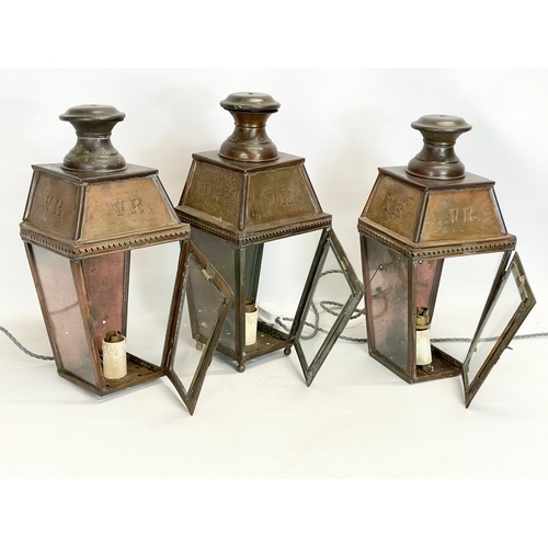 19 - A set of 3 vintage copper electric lanterns. 21x16x42cm