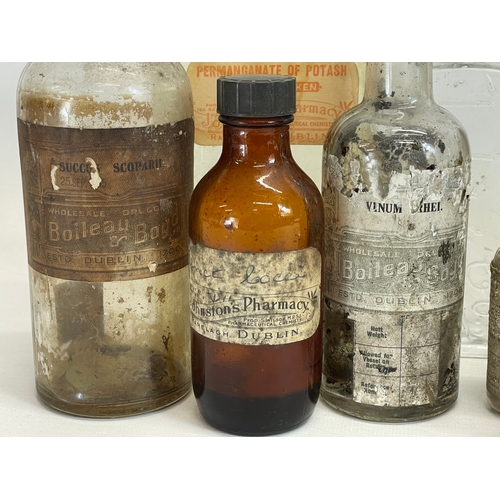 68 - A collection of late 19th-early 20th century Irish chemist bottles. Boileau & Boyd Dublin, Evans Med... 