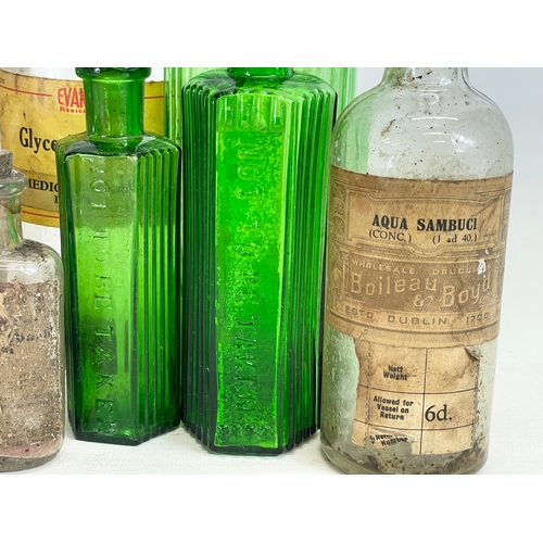 68 - A collection of late 19th-early 20th century Irish chemist bottles. Boileau & Boyd Dublin, Evans Med... 