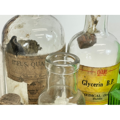 68 - A collection of late 19th-early 20th century Irish chemist bottles. Boileau & Boyd Dublin, Evans Med... 