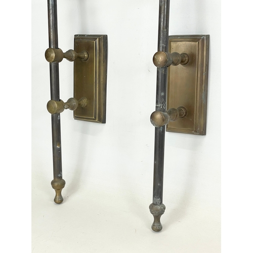 20 - A pair of large vintage heavy brass wall sconces with glass shades. 65cm