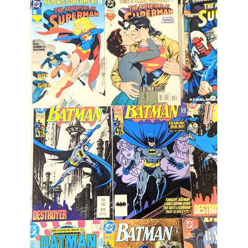 199 - A collection of vintage DC Universe comics including Batman and Superman.