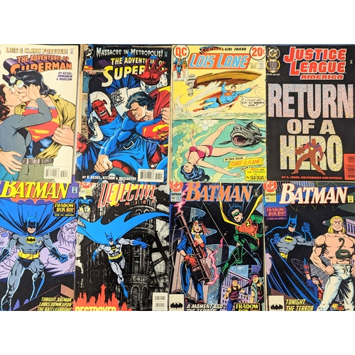 199 - A collection of vintage DC Universe comics including Batman and Superman.